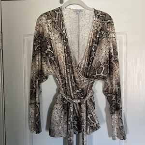 Snakeskin knit wrap top